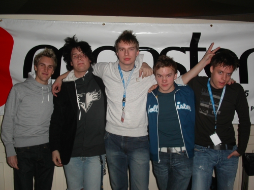 Gruppbild på OMS med zaffe till vänster